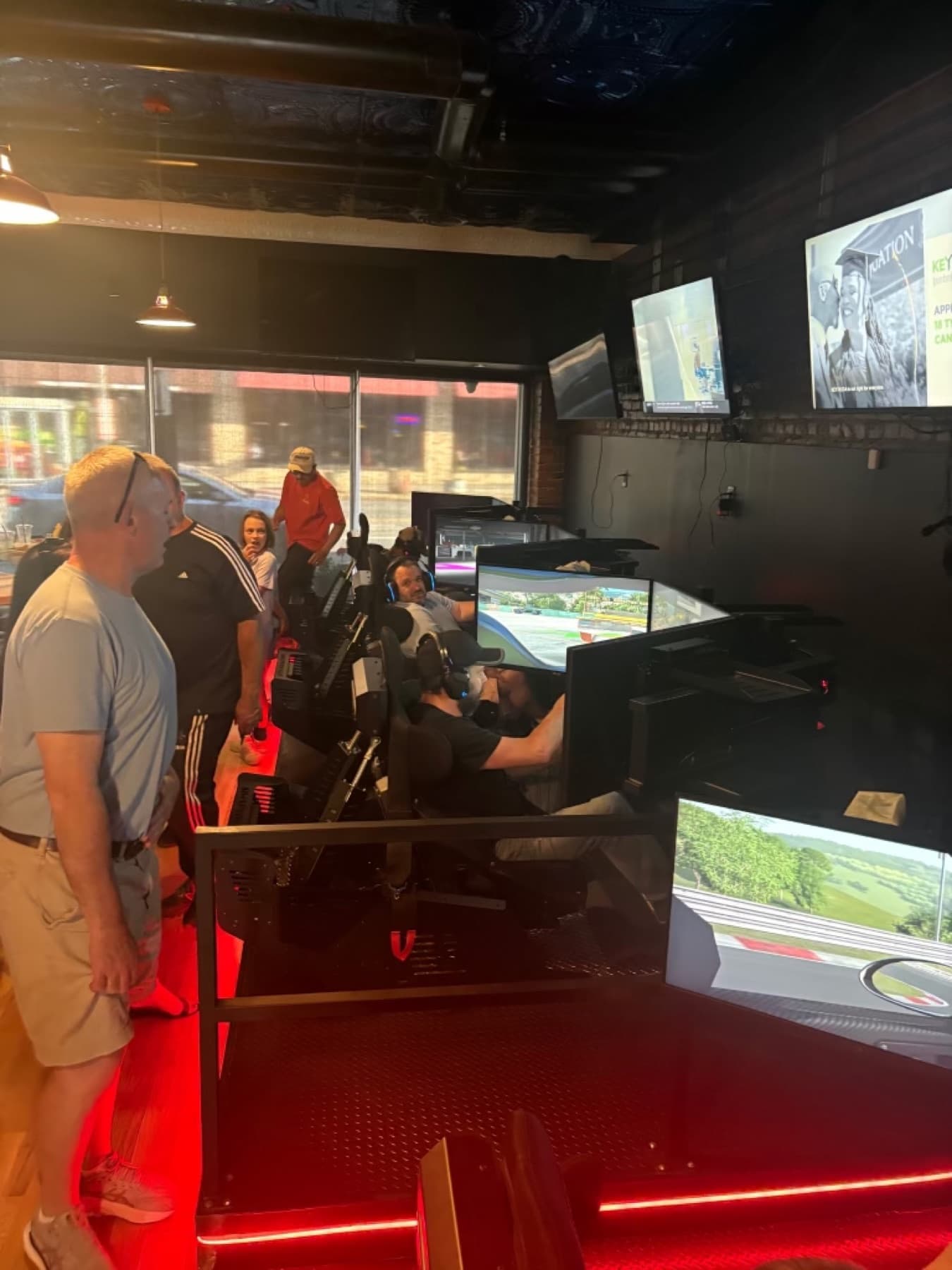 Drivers racing in Speed Trap’s simulator bays